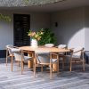 4 Seasons Outdoor Tess dining set teak met Corsica tafel met kiezelvormig blad 240 x 130 cm